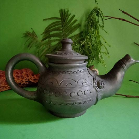 Black pottery crafted in Kota, Rajasthan – a local adaptation of the ancient Blue Pottery technique.