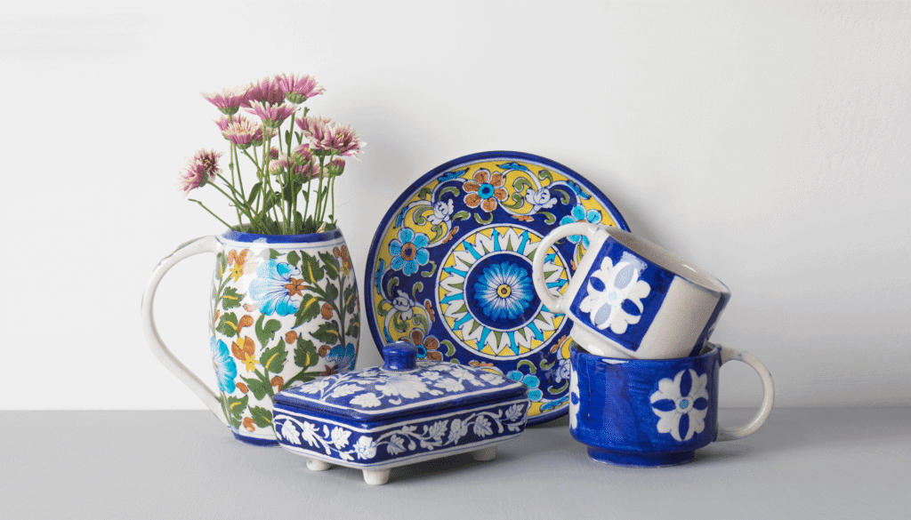 Handcrafted Jaipur Blue Pottery showcasing Persian-inspired floral patterns in cobalt blue and turquoise hues.
