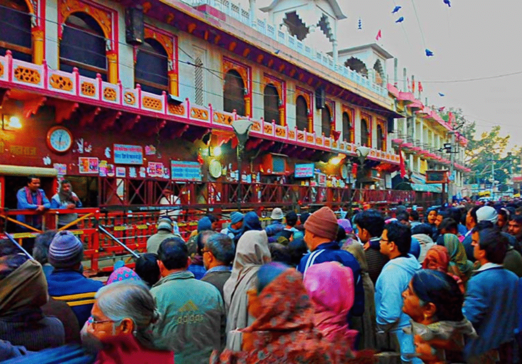Devotees offering prayers outside Mehndipur Balaji Temple during a spiritual healing ritual.